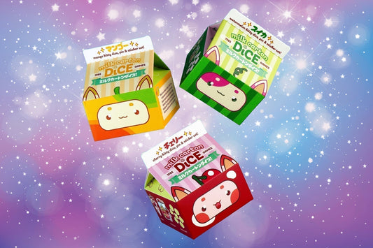Fruit-themed milk carton dice sets suspended against a rainbow sparkly background.