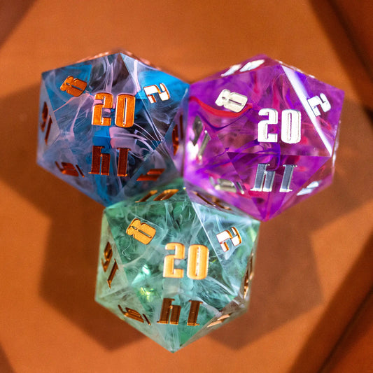 Three 55mm hand-poured resin D20 dice displayed together outside their boxes—perfect for D&D, Pathfinder, and RPG collectors.
